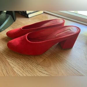 Antonio Melani red suede slip on heeled mules.